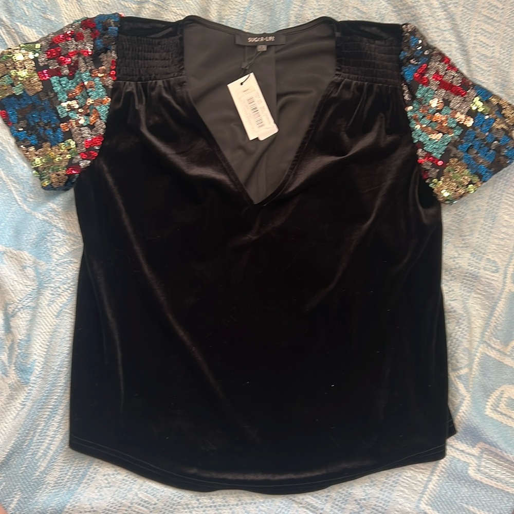 New with tags Sequined sleeve Sugar lips light velvety v neck blouse